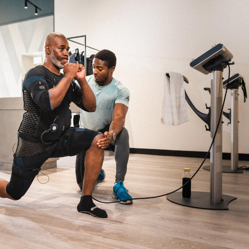 EMS Personal Training in Canterbruy 2 people doing EMS personal training session in Canterbury.