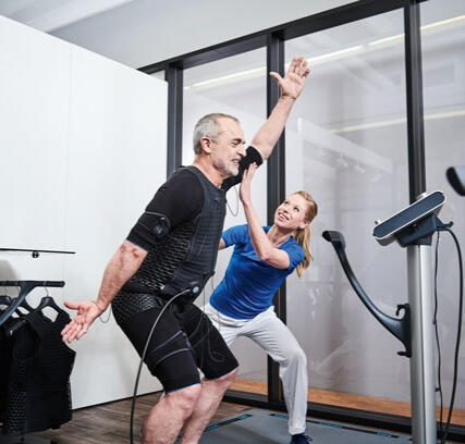 EMS Personal Training in Canterbruy 2 people doing EMS personal training session in Canterbury.