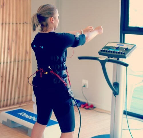 EMS Personal Training in Canterbruy 2 people doing EMS personal training session in Canterbury.