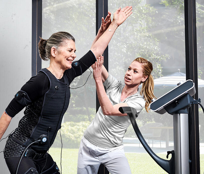 EMS Personal Training in Canterbruy 2 people doing EMS personal training session in Canterbury.